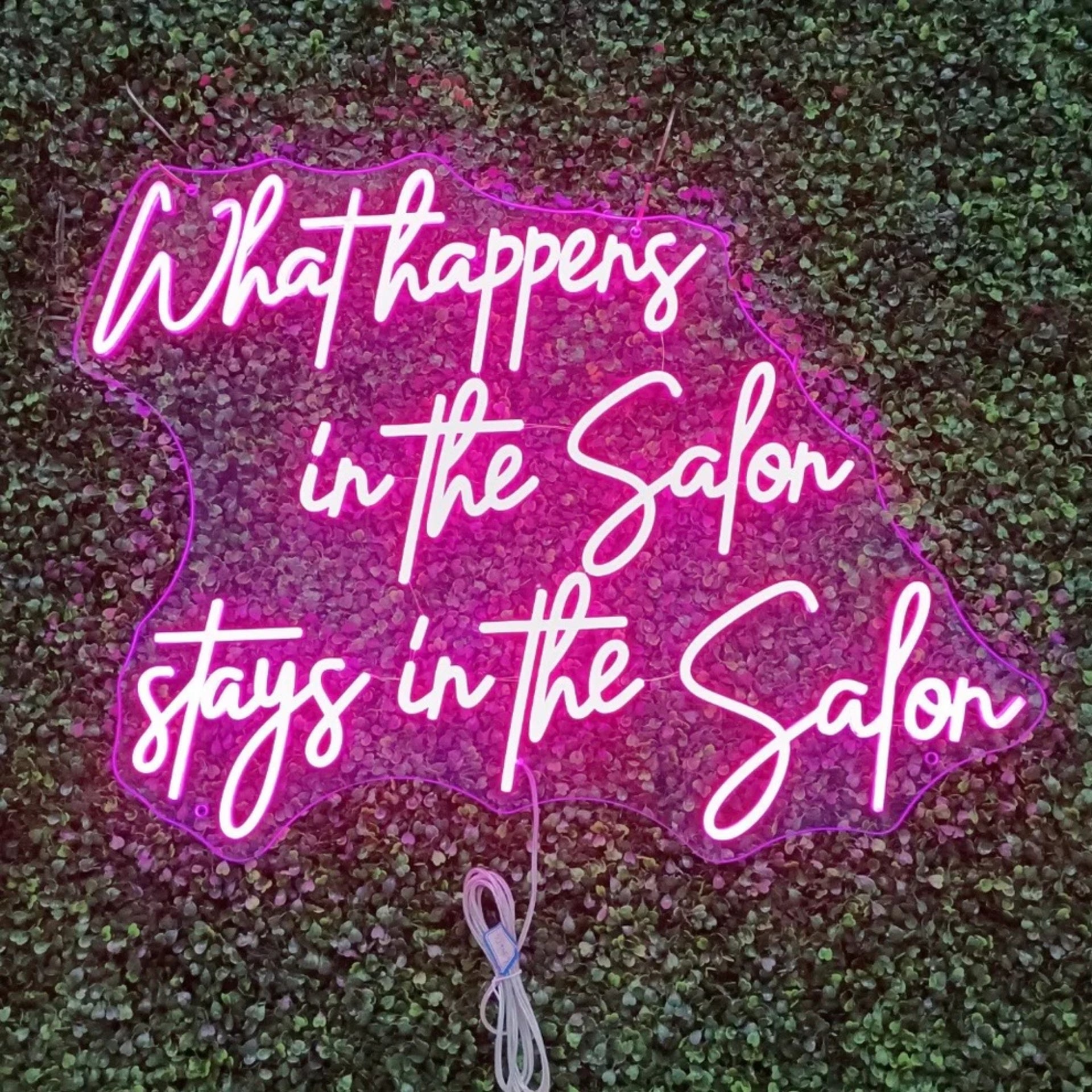 What happens in the Salon Neon Sign